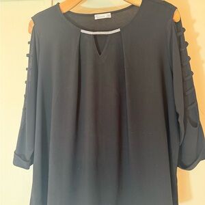 89th and Madison Black Blouse with Cut-Out Sleeve Design. Crystals along throat